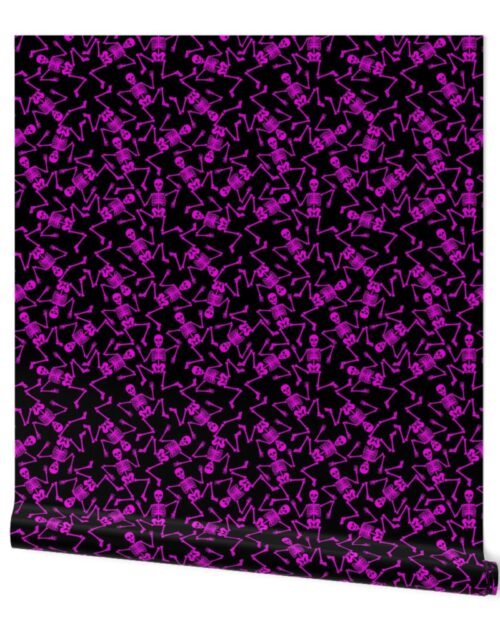 Small Bright Pink Dancing Halloween Skeletons Scattered On Black Wallpaper