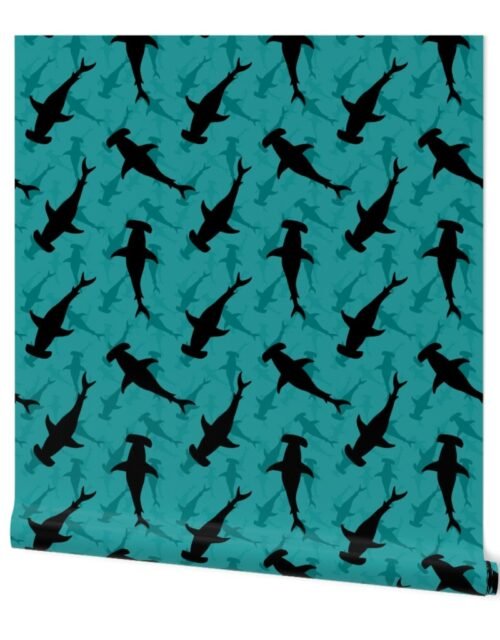 Dark Hammerhead Sharks Silhouette Circling  in Lagoon Blue Water Wallpaper