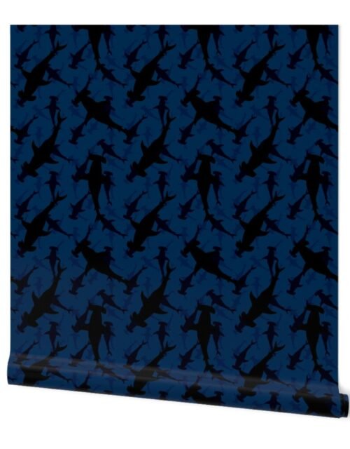 Dark Hammerhead Sharks Silhouette Circling  in Cobalt Blue Water Wallpaper