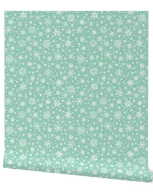 Small Merry Bright Mint Green  and White Splattered Snowflakes Wallpaper