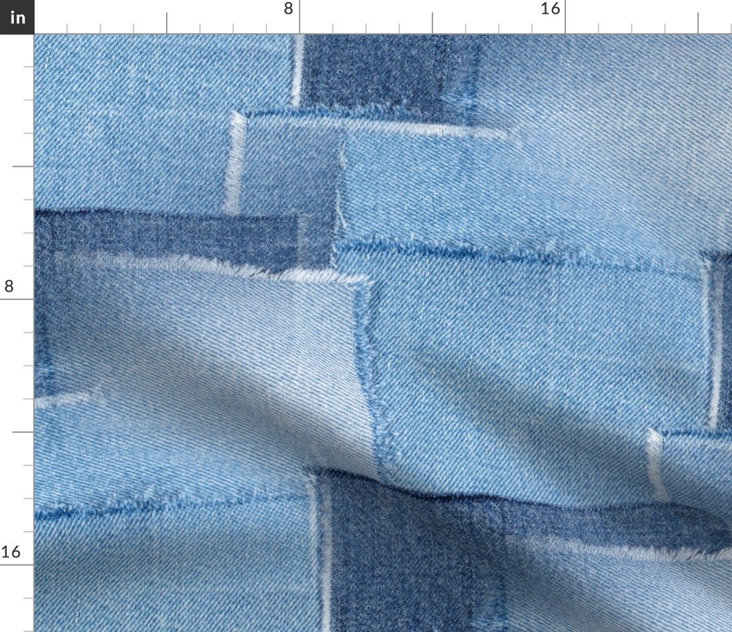 Abstract Patchwork Pattern of Frayed and Fringed Patches of Blue Denim Cloth Fabric