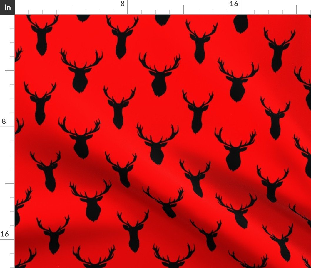 Black Buck Deer Trophy Heads with Antler Racks Mounted on Red Fabric