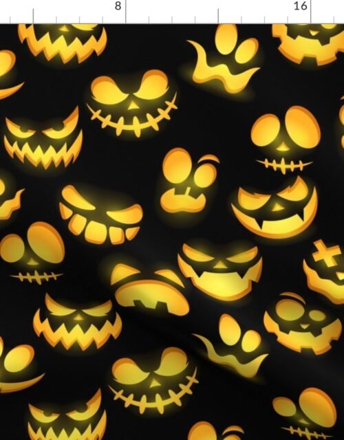 Grinning Halloween Jack o Lantern Faces in Orange on Black Fabric